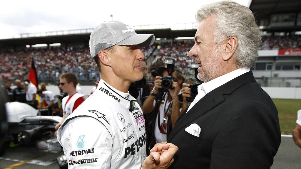 Michael Schumacher (vasemmalla) ja hänen pitkäaikainen managerinsa Willi Weber (oikealla).