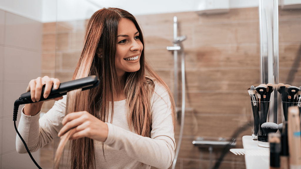 hiustensuoristin, suoristaa hiuksia