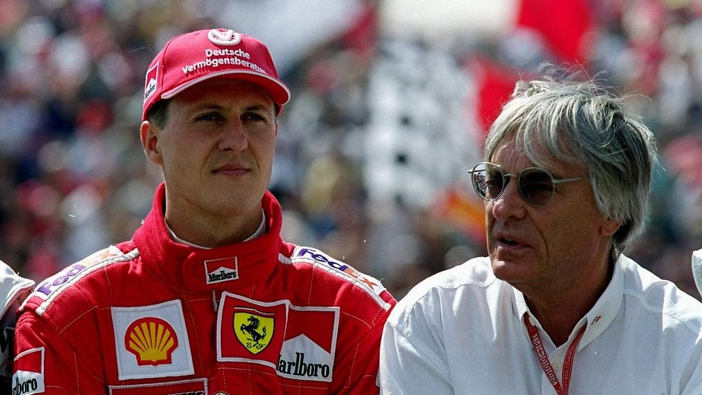 Michael Schumacher (vas.) ja Bernie Ecclestone.