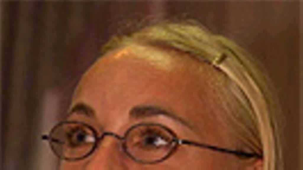 Gabriela Szabo, Photo: Andy Lyons/ALLSPORT