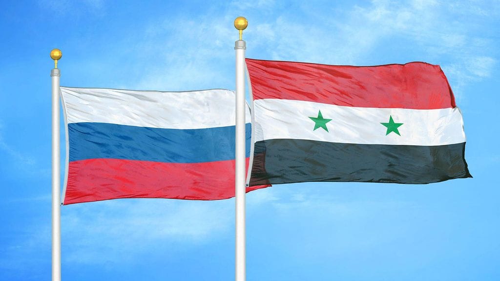 Osa venäläisurheilijoista on yrittänyt päästä kilpailemaan Syyrian joukkueessa valeidentiteetillä. Kuvituskuva maiden lipuista.