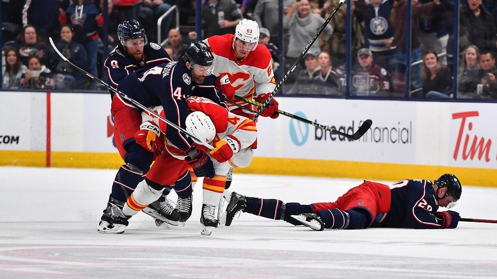 Patrik Lainetta taklattiin pään seudulle Calgary-ottelun lopussa.