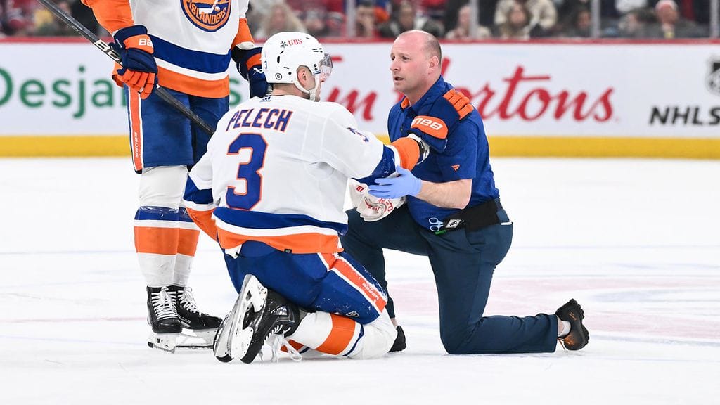 Adam Pelech sai kyynärpäästä päähänsä.