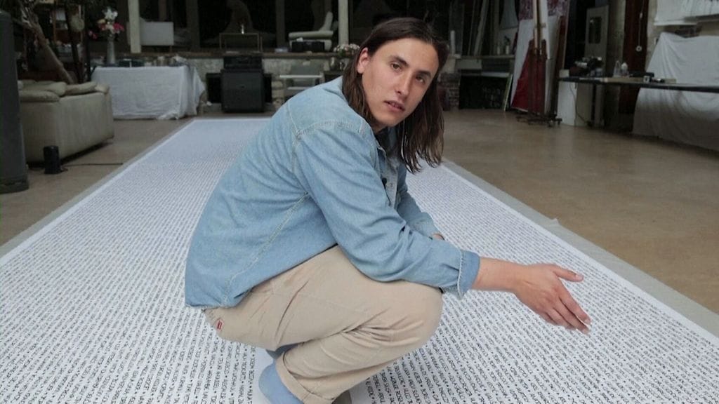 30 249 nimeä, 120-metrinen paperirulla: Baptiste Chebassier valmistelee huimaa taideteosta Pariisin olympialaisten kulisseissa