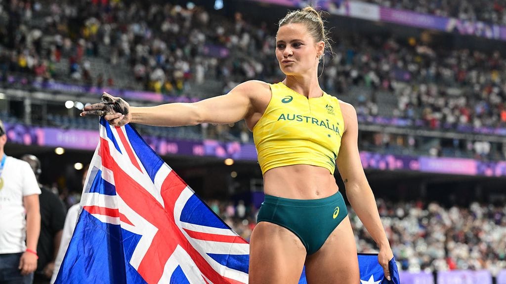 Nina Kennedy väläytti voiton kunniaksi Pariisin kisoissa suosioon nousseen pyssytuuletuksen.