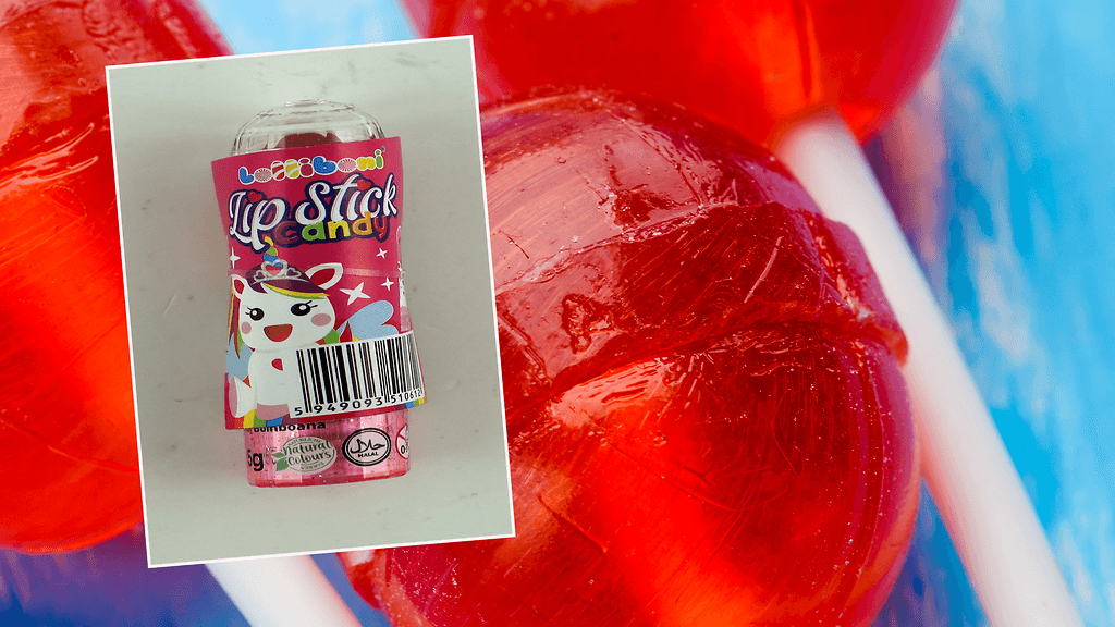 Huulipunan mallinen tikkari voi aiheuttaa tukehtumisvaaran. Taustalla kuvituskuva.