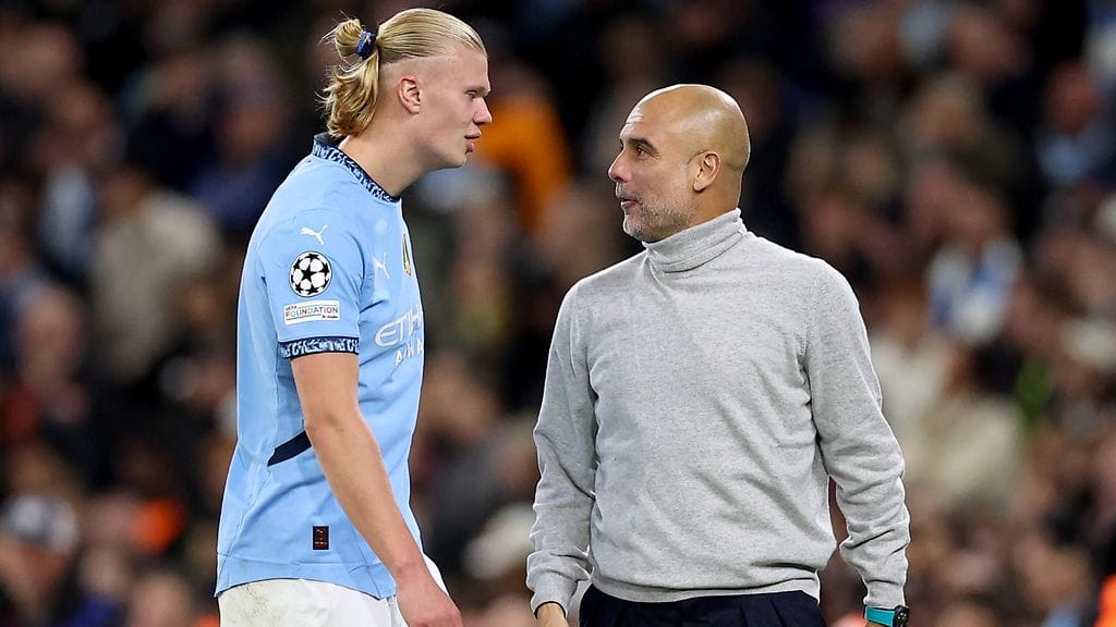Erling Haaland (vasemmalla) ja Pep Guardiola (oikealla).