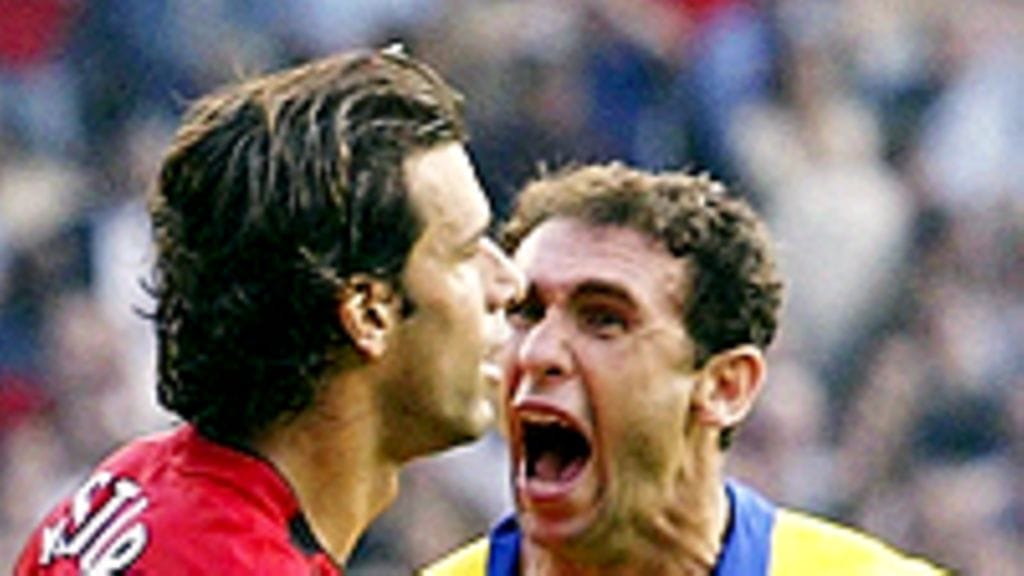 Ruud Van Nistelrooy ja Martin Keown (Photo: Shaun Botterill/Getty Images)