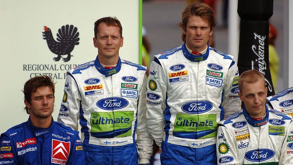 Sébastien Loeb (vas.), Marcus Grönholm (toinen oik.) ja Mikko Hirvonen (oik.) olivat 2000-luvun kovimpia rallitähtiä.