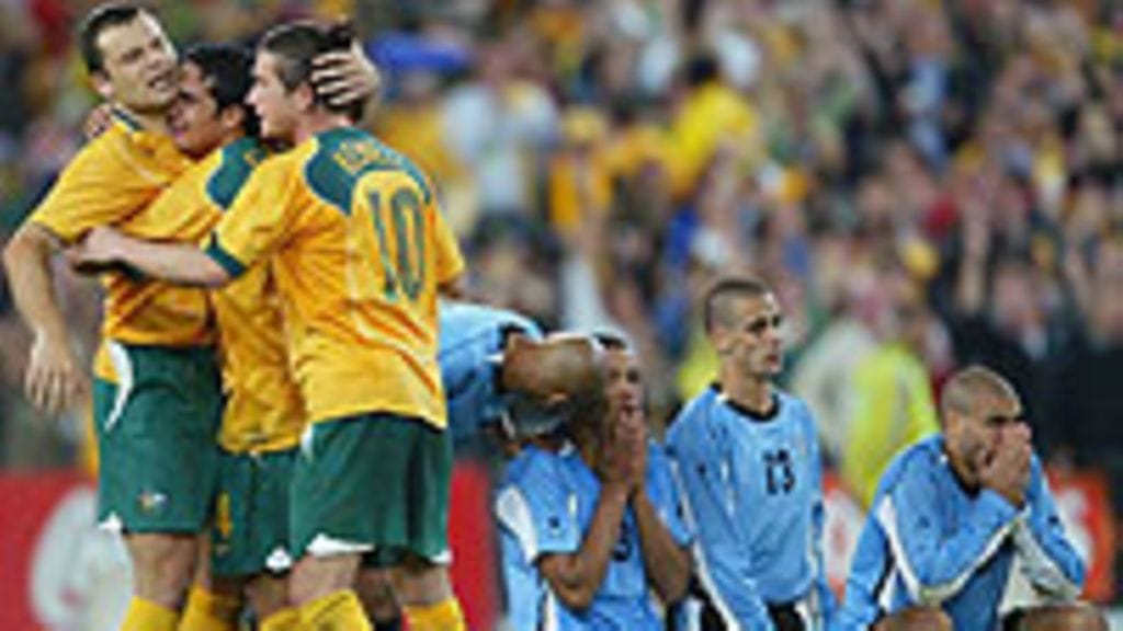 Mark Viduka, Tim Cahill ja Harry Kewell Australia juhlii MM-kisapaikkaa, kuva: Mark Nolan/Getty Images