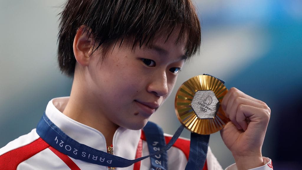 Uimahyppyjen kolminkertainen olympiavoittaja Quan Hongchan, 18, on yksi huijauksen uhreista.