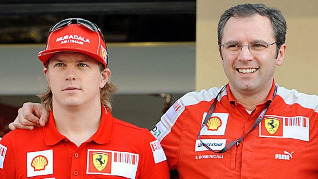 Kimi Räikkönen ja Stefano Domenicali, 2009, kuva: EPA/PETER STEFFEN