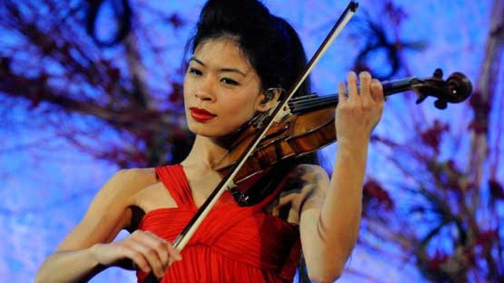 Viulisti Vanessa-Mae tunnetaan seksikkäästä imagostaan.