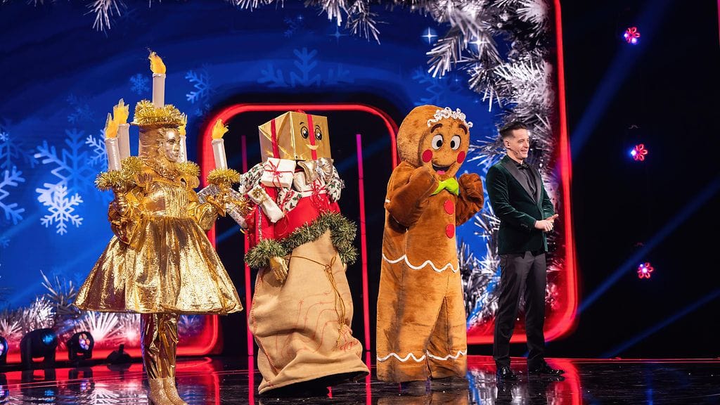 masked_singer_suomi_s7_eps13_pelastakaa_lapset_024_ile_uusivuori_kynttila_lahjasakki_pipari_kuvaaja_saku_tiainen