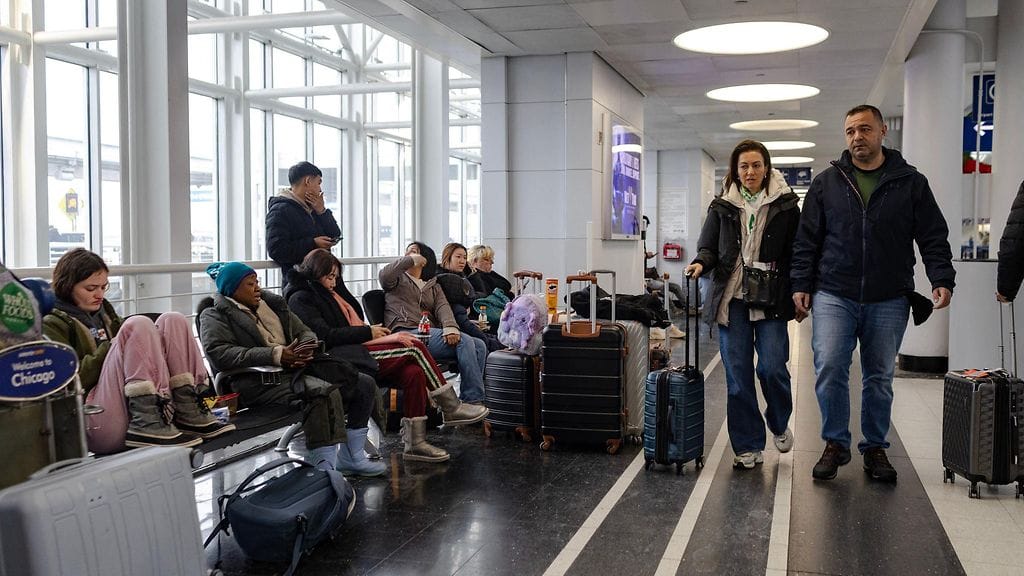 Ihmisiä lentokentällä Chicagossa marraskuussa.