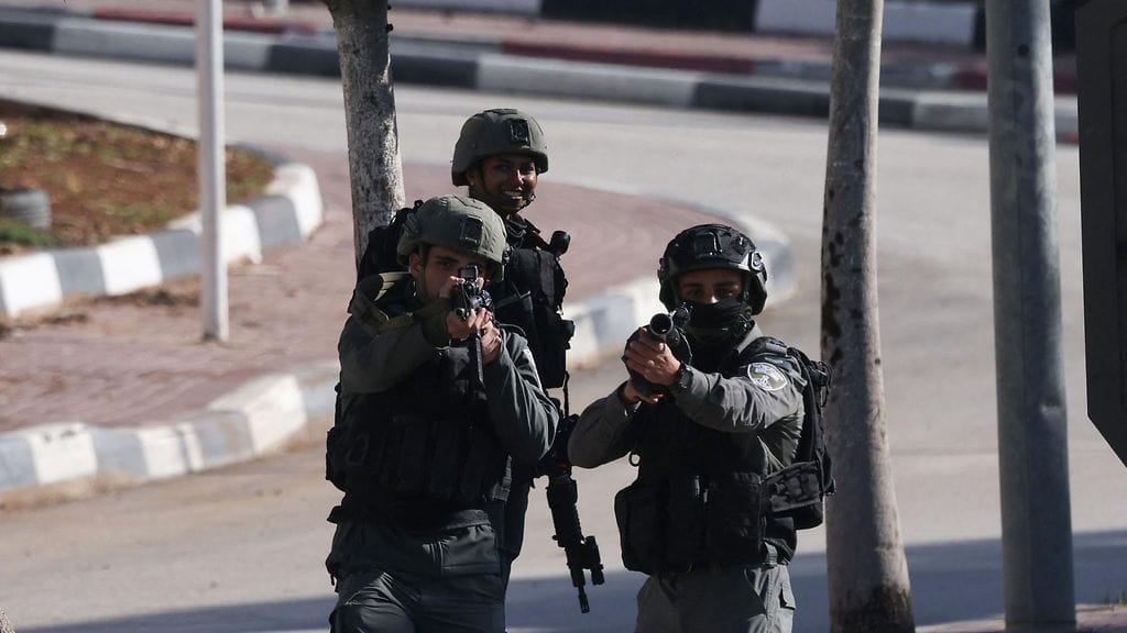 Israelilaisia turvamiehiä kuvattuna keskiviikkona 10. joulukuuta.