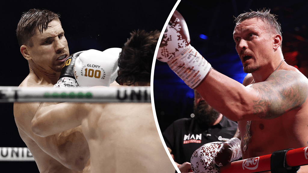 Rico Verhoeven (vas.) haastaa Oleksandr Usykin nyrkkeilyn MM-ottelussa.