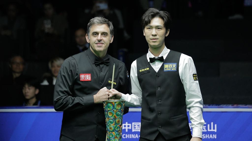 Ronnie O'Sullivan (vas.) taipui Thepchaiya Un-Noohille.