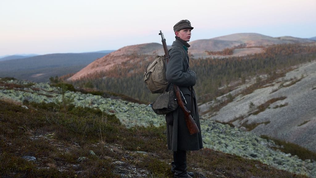 Sotilas Heikki Ojalana Lapin sota -elokuvassa nähdään näyttelijä Luukas Niskanen.