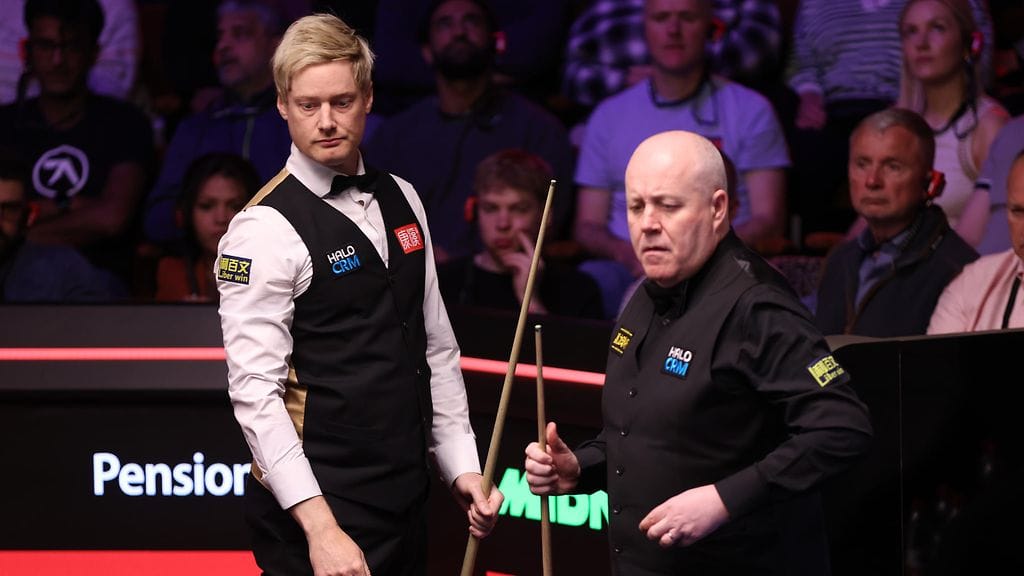 Neil Robertson (vas.) esitti sensaatiomaisen lyönnin, mutta taipui Joh Higginsille, joka nousi edellisellä kierroksella voittoon isolta takamatkalta Ronnie O'Sullivania vastaan.