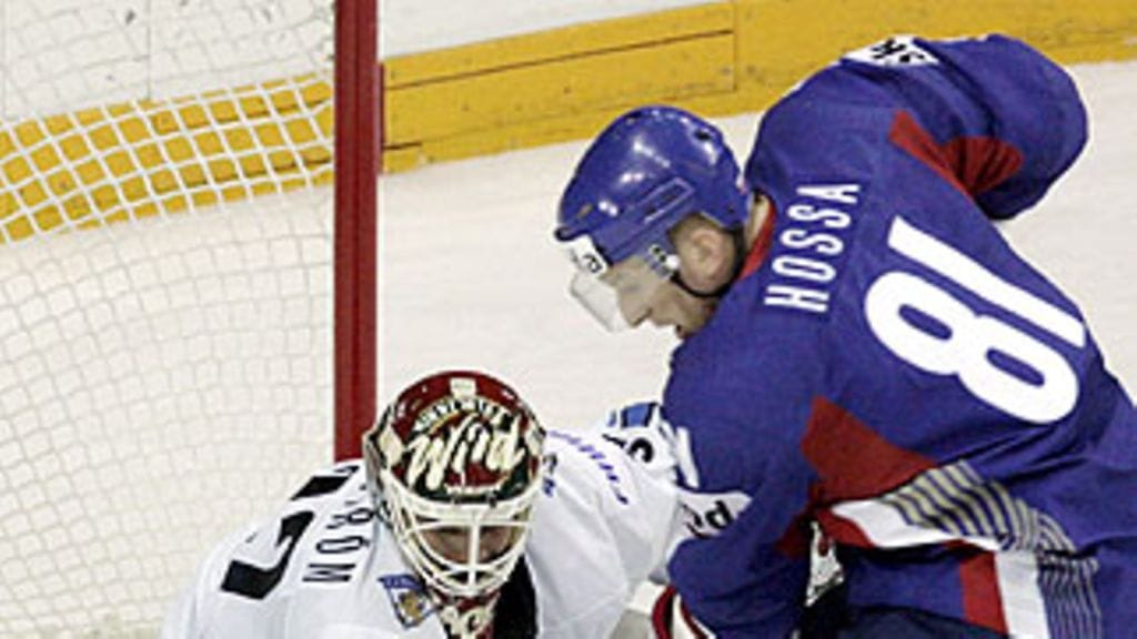 Niklas Bäckström ja Slovakian Marcel Hossa, kuva: EPA/VALDA KALNINA